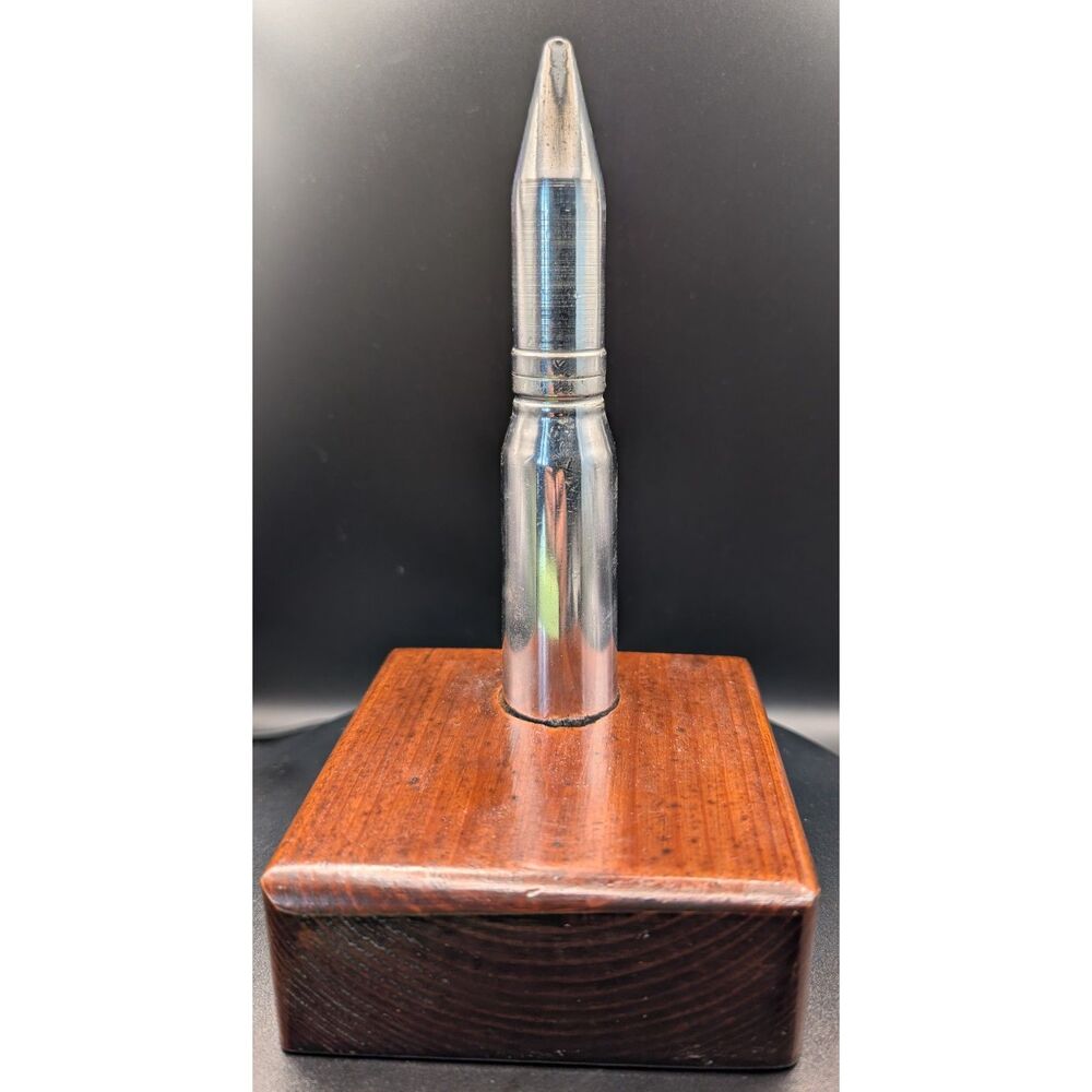 Machined Bullet Display Piece on Wood Base – Industrial Desk Art or Paperweight